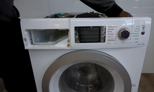 Bosch front-load washer repair Encinitas California E18 drain error hard water scale pump filter
