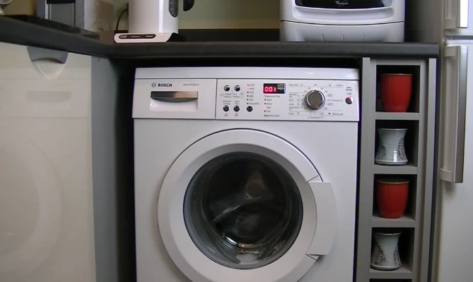 Bosch washer repair California — WasherDoctor technician servicing Bosch 800 Series front-load