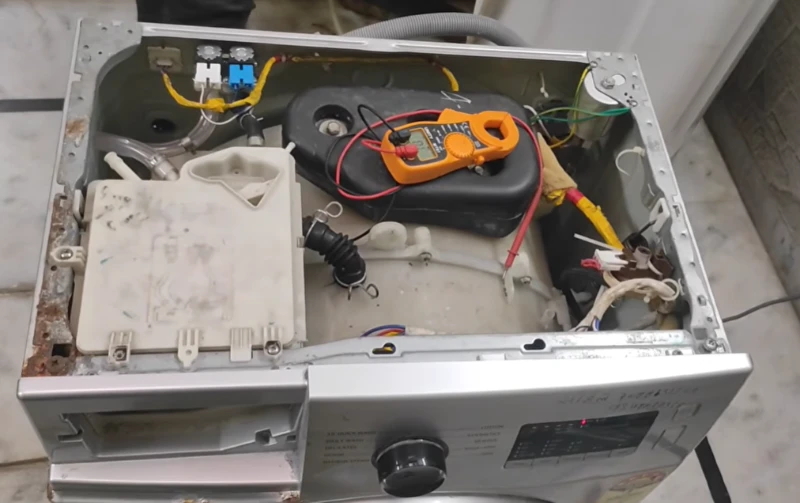 Samsung washer repair California — WasherDoctor technician diagnosing Samsung front-load